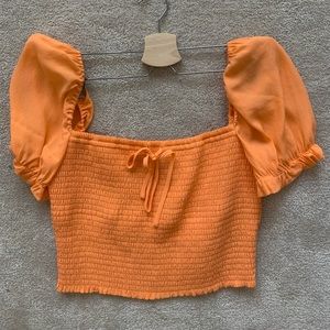 Wilfred Smocked Blouse in Papaya Orange